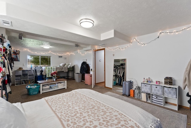 3022 E Pineglen Ave, Mead, WA 99021 - carpeted bedroom featuring a textured ceiling