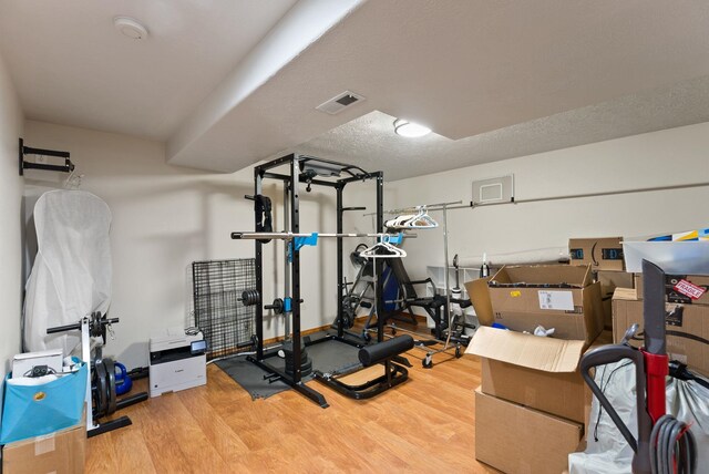 3022 E Pineglen Ave, Mead, WA 99021 - workout room featuring wood finished floors