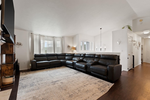 3022 E Pineglen Ave, Mead, WA 99021 - living room with dark wood-type flooring, a chandelier, and baseboards