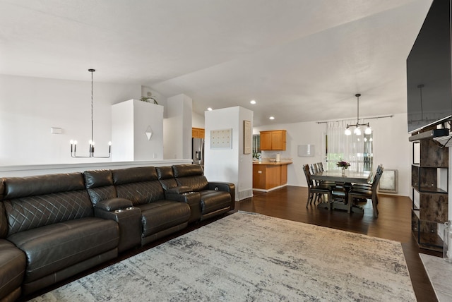 3022 E Pineglen Ave, Mead, WA 99021 - living area with a chandelier, dark wood-style flooring, vaulted ceiling, and recessed lighting