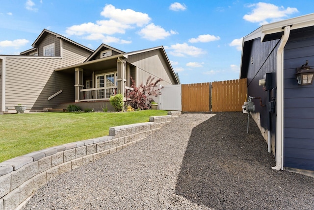 3022 E Pineglen Ave, Mead, WA 99021 - view of home's exterior with a porch and a gate