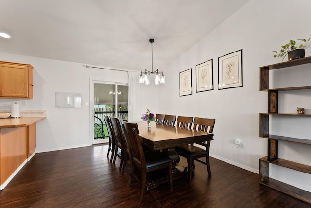 3022 E Pineglen Ave, Mead, WA 99021 - dining space featuring a chandelier, dark wood-style flooring, and baseboards