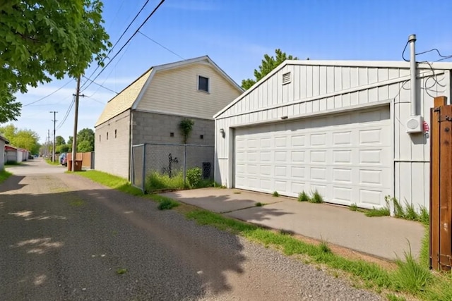garage featuring fence