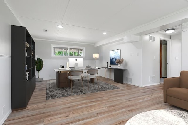 office area with light wood-type flooring, recessed lighting, ornamental molding, and baseboards