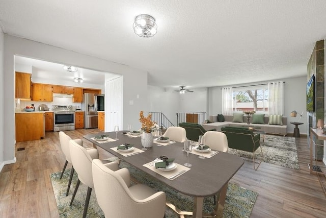 dining room with light wood-type flooring