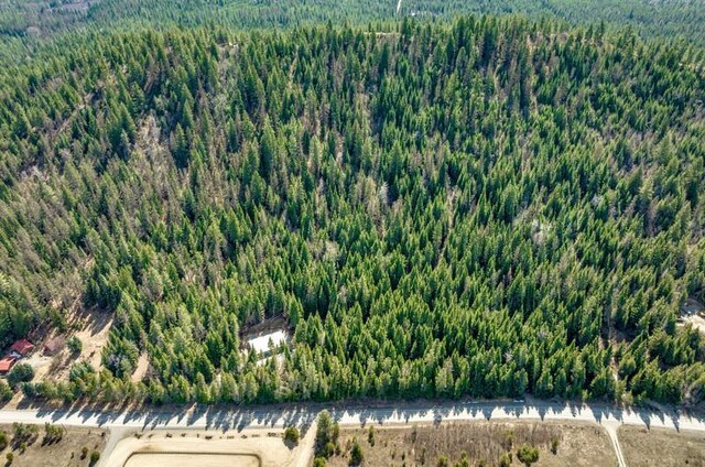 4821 Coyote Trl, Newport, WA 99156 - aerial overview of property's location featuring a heavily wooded area