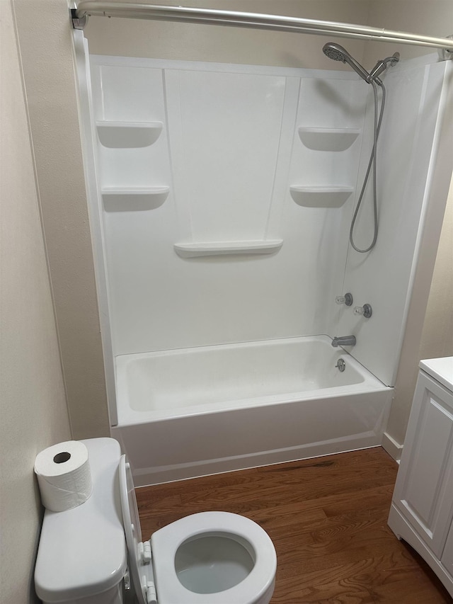 2304 W Glass St, Spokane, WA 99205 - bathroom featuring wood finished floors, shower / washtub combination, vanity, and toilet