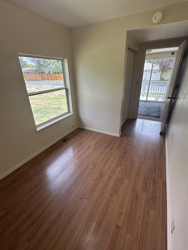 2304 W Glass St, Spokane, WA 99205 - spare room featuring wood finished floors, baseboards, and a smoke detector