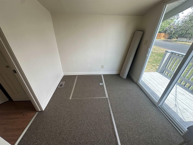 2304 W Glass St, Spokane, WA 99205 - unfurnished bedroom with multiple windows, baseboards, and carpet floors