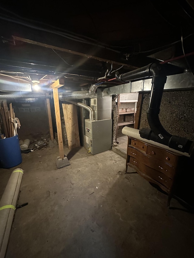 2304 W Glass St, Spokane, WA 99205 - unfinished basement featuring heating unit