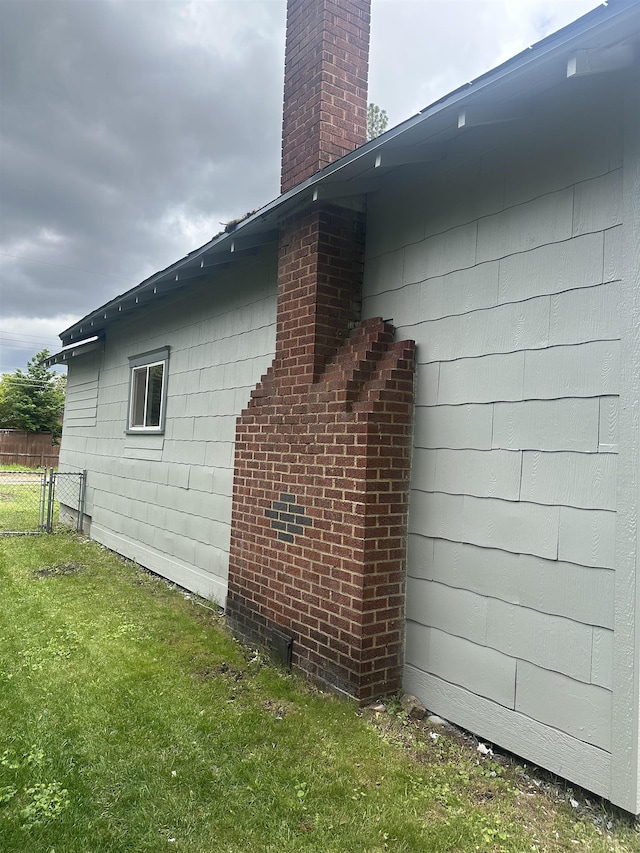 2304 W Glass St, Spokane, WA 99205 - view of side of property featuring a chimney