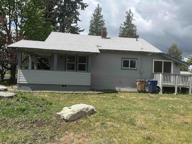 2304 W Glass St, Spokane, WA 99205 - back of house with a lawn, a chimney, a deck, and crawl space