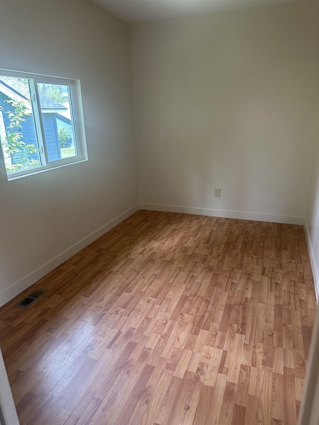 2304 W Glass St, Spokane, WA 99205 - empty room featuring light wood-style flooring and baseboards