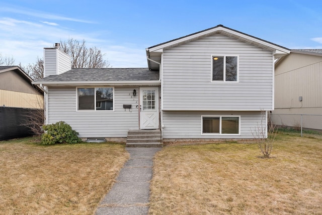 2612 E Longfellow Ave, Spokane, WA 99207 - split level home with entry steps, a chimney, and roof with shingles