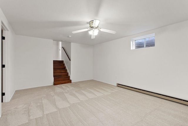 2612 E Longfellow Ave, Spokane, WA 99207 - basement with baseboard heating, carpet, stairs, and ceiling fan