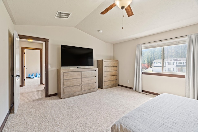 9414 W Ballesteros Ct, Cheney, WA 99004 - bedroom featuring lofted ceiling, light carpet, baseboards, and ceiling fan