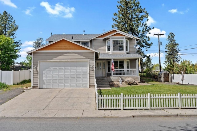 1626 5th St, Cheney, WA 99004 - traditional-style home with covered porch, an attached garage, and concrete driveway