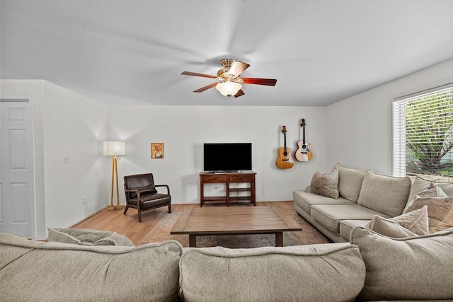 1626 5th St, Cheney, WA 99004 - living room with ceiling fan, light wood-style floors, and baseboards