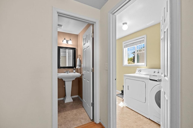 1626 5th St, Cheney, WA 99004 - washroom with washing machine and dryer and light tile patterned flooring