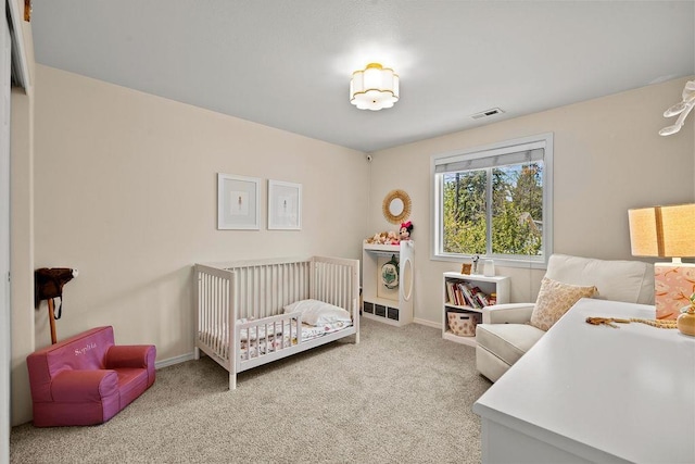 1626 5th St, Cheney, WA 99004 - bedroom with carpet flooring, a crib, and baseboards