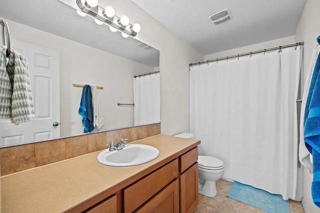 1626 5th St, Cheney, WA 99004 - bathroom featuring toilet, vanity, and tile patterned flooring