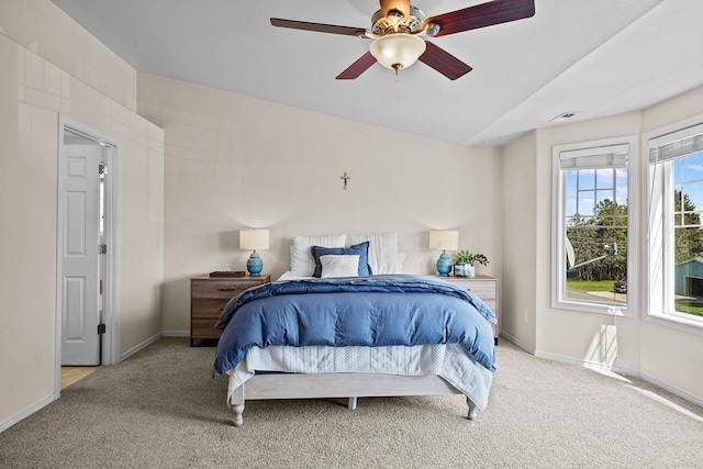 1626 5th St, Cheney, WA 99004 - bedroom with light carpet, baseboards, and a ceiling fan