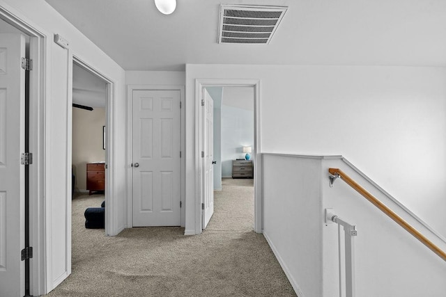 1626 5th St, Cheney, WA 99004 - hallway with carpet flooring and an upstairs landing