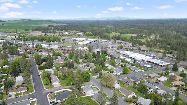 1626 5th St, Cheney, WA 99004 - aerial view of property and surrounding area with a forest and nearby suburban area