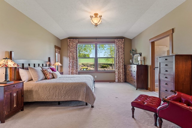 4224 E Hoffman Ln, Spokane, WA 99223 - bedroom with lofted ceiling, light colored carpet, and baseboards