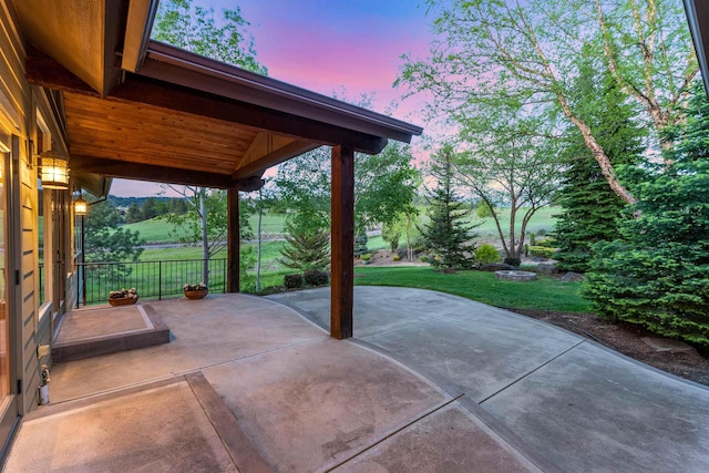 4224 E Hoffman Ln, Spokane, WA 99223 - patio terrace at dusk with a yard