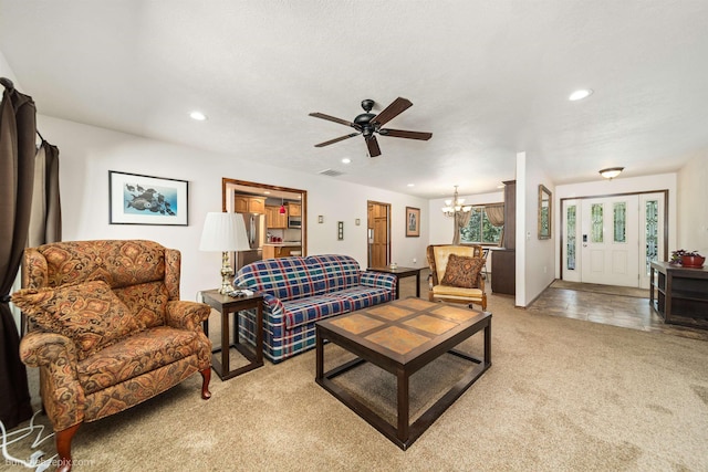 living room featuring light carpet, a chandelier, ceiling fan, and recessed lighting
