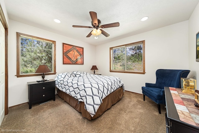 carpeted bedroom with recessed lighting, a ceiling fan, and baseboards