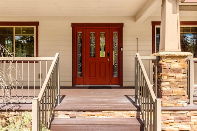 entrance to property with covered porch