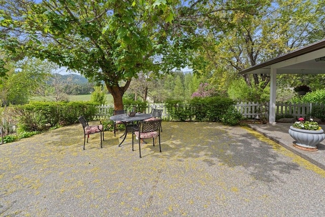 2059 Dry Creek Rd, Chewelah, WA 99109 - view of patio / terrace with fence and outdoor dining area
