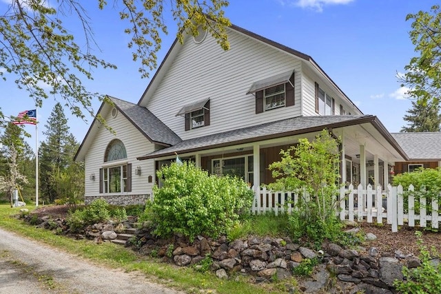 2059 Dry Creek Rd, Chewelah, WA 99109 - view of property exterior with fence, roof with shingles, and covered porch