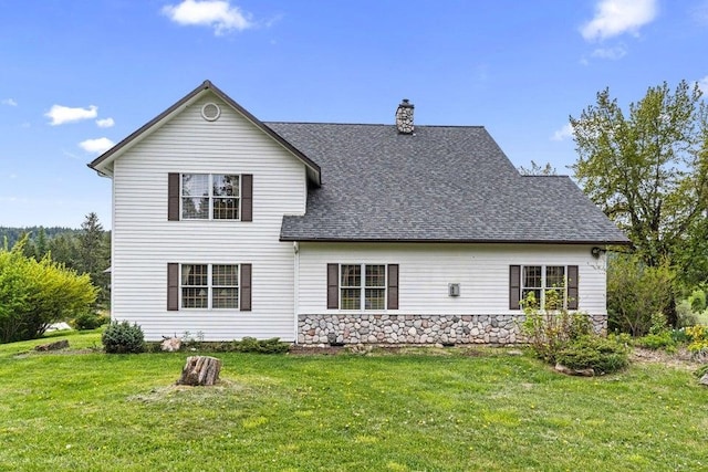 2059 Dry Creek Rd, Chewelah, WA 99109 - rear view of property with a lawn, a chimney, a shingled roof, and stone siding