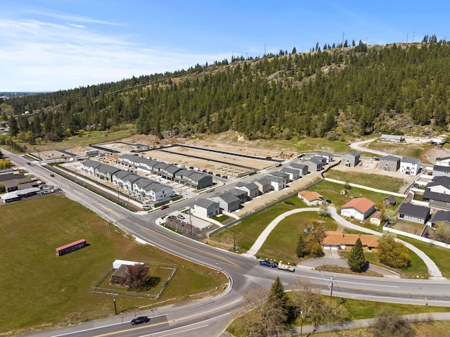 3285 N Mckinnon Rd, Spokane, WA 99217 - aerial view of property and surrounding area featuring a forest and nearby suburban area