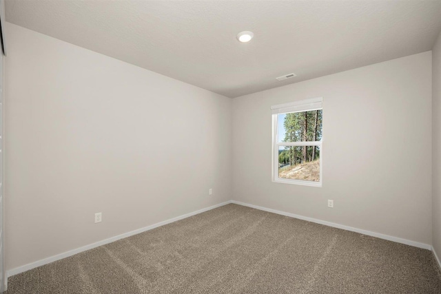 3285 N Mckinnon Rd, Spokane, WA 99217 - unfurnished room with carpet flooring, baseboards, and recessed lighting