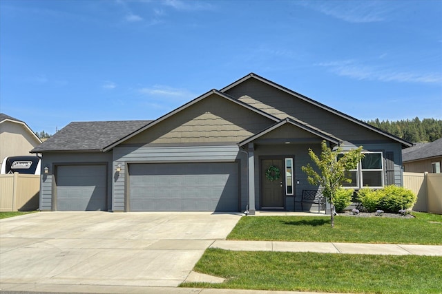 14621 E Sanson Ave, Spokane Valley, WA 99216 - view of front of house featuring a garage and concrete driveway
