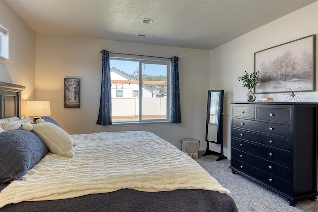 14621 E Sanson Ave, Spokane Valley, WA 99216 - bedroom with carpet, a textured ceiling, and baseboards