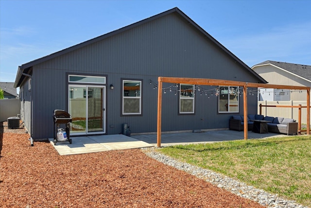 14621 E Sanson Ave, Spokane Valley, WA 99216 - back of property with an outdoor hangout area, a patio, and fence