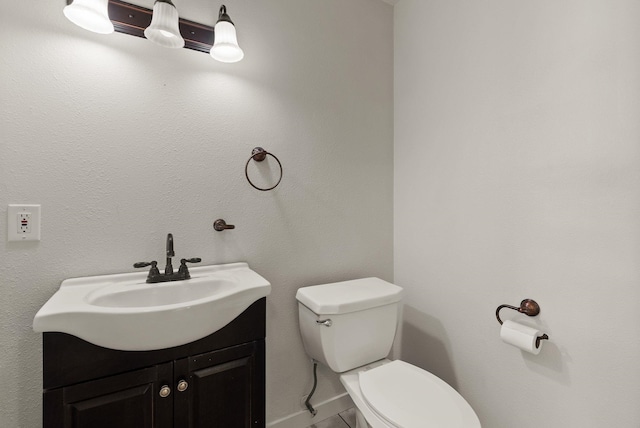 13704 E Heroy Ave, Spokane Valley, WA 99216 - half bathroom featuring toilet and vanity