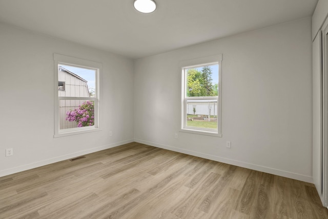 13704 E Heroy Ave, Spokane Valley, WA 99216 - unfurnished room with light wood finished floors and baseboards