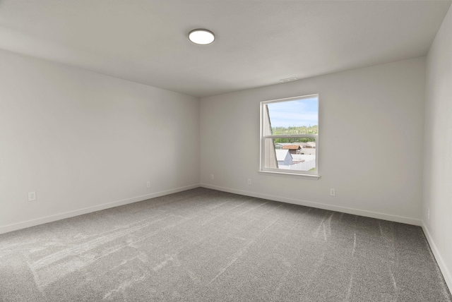 13704 E Heroy Ave, Spokane Valley, WA 99216 - carpeted spare room with baseboards