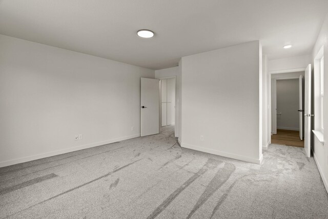 13704 E Heroy Ave, Spokane Valley, WA 99216 - unfurnished bedroom featuring light colored carpet and baseboards