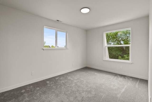13704 E Heroy Ave, Spokane Valley, WA 99216 - carpeted spare room with plenty of natural light and baseboards