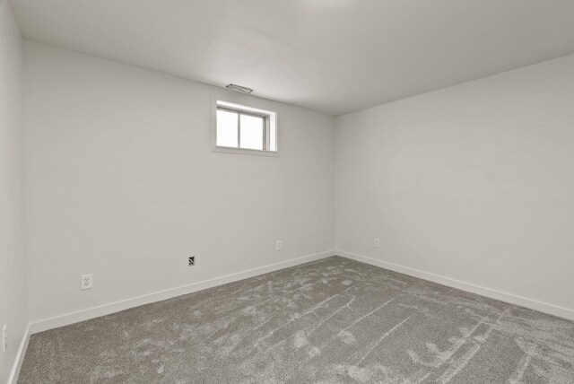 13704 E Heroy Ave, Spokane Valley, WA 99216 - carpeted empty room with baseboards