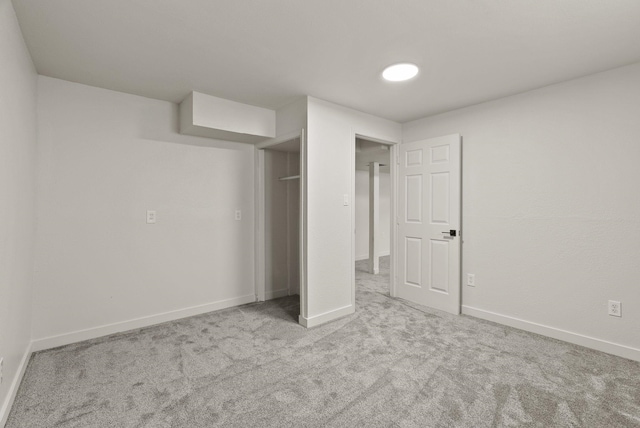 13704 E Heroy Ave, Spokane Valley, WA 99216 - unfurnished bedroom featuring carpet flooring, baseboards, and a closet