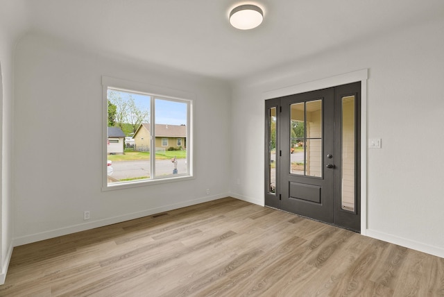 13704 E Heroy Ave, Spokane Valley, WA 99216 - entryway featuring light wood-style floors and baseboards