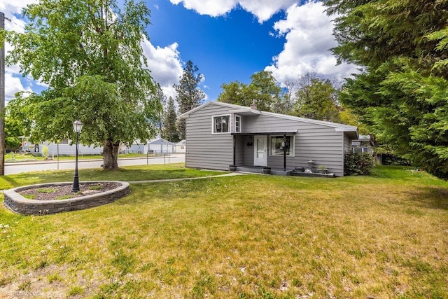 5503 N Cedar St, Spokane, WA 99205 - rear view of property featuring a yard